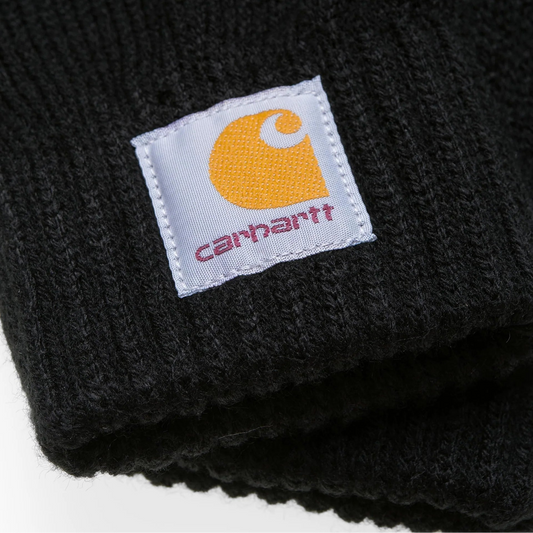 Black knit beanie with Carhartt logo tag on a white background