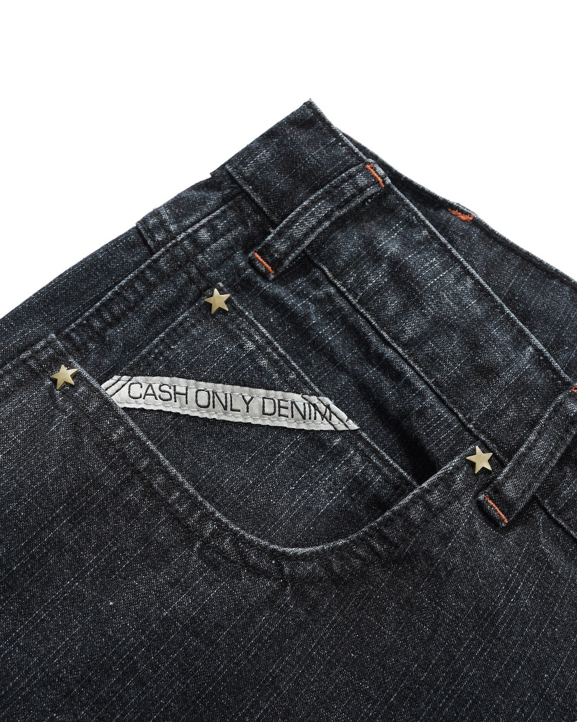 Close-up of a black denim pocket with 'Cash Only Denim' branding on a white background